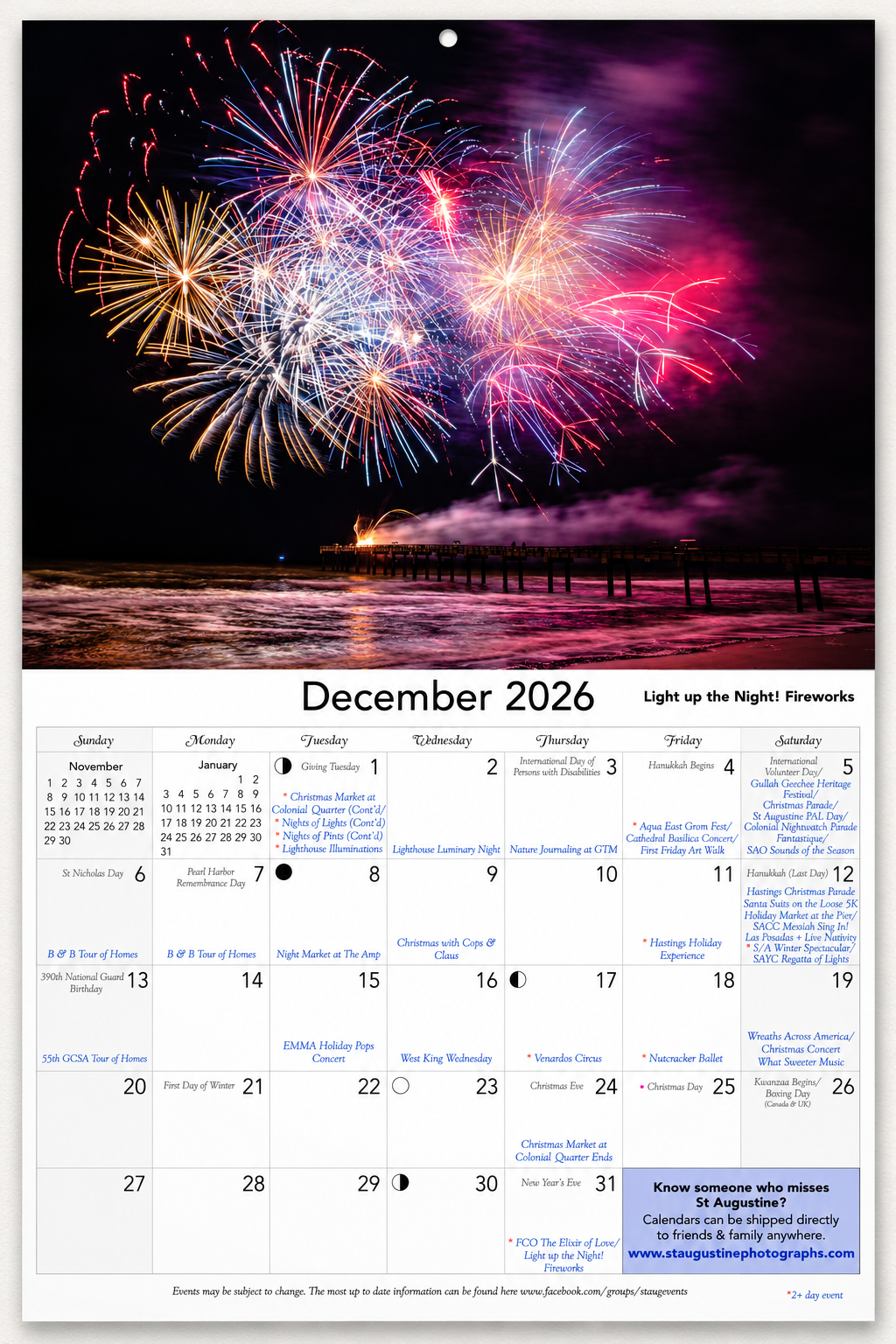 Colorful pink, gold, blue and white fireworks illuminate the St. Augustine Beach Pier and Atlantic Ocean above the December 2026 St. Augustine wall calendar's event grid.
